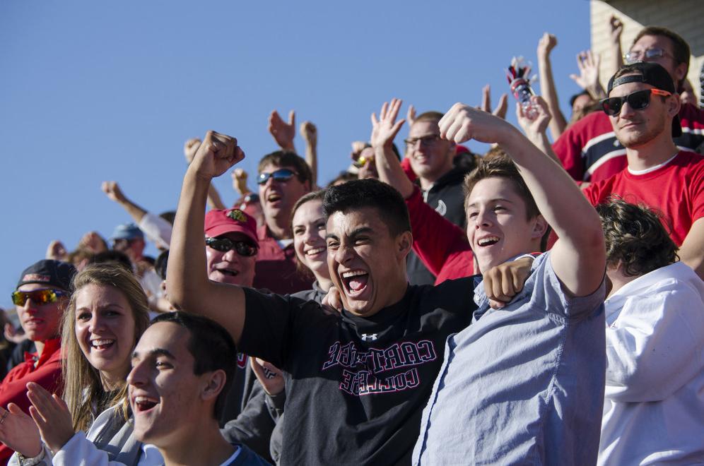 A photo of the crowd at a homecoming football game.